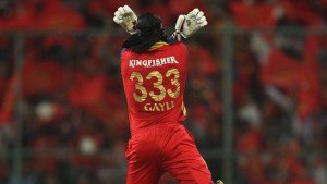 Chris Gayle of the Royal Challengers Bangalore celebrates reaching his century during match 40 of the Pepsi IPL 2015 (Indian Premier League) between The Royal Challengers Bangalore and The Kings XI Punjab held at the M. Chinnaswamy Stadium in Bengaluru, India on the 6th May 2015. Photo by: Shaun Roy / SPORTZPICS / IPL